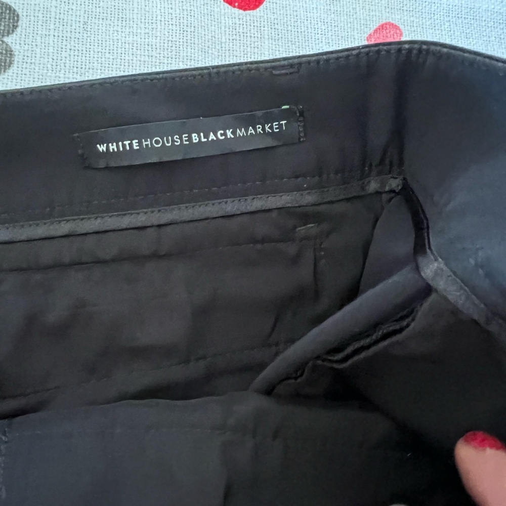 Size 12, New without tags, black capri White House Black Market pants.